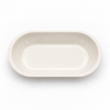 Overhead view of the cream Whisker-Wide Bowl insert showing its wide, shallow oval shape